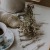 tea and cookies on a serving tray with baby's breath