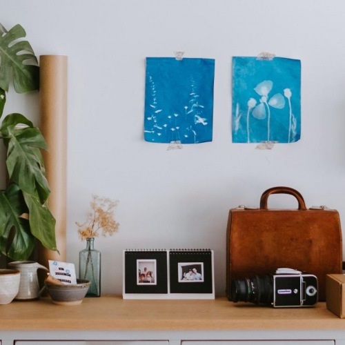 Refined spaces to match your style large dresser with a variety of decor on it